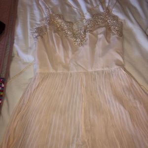 Creme colored romper with lace bodice